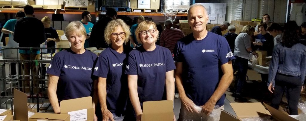 Volunteers packing water filters