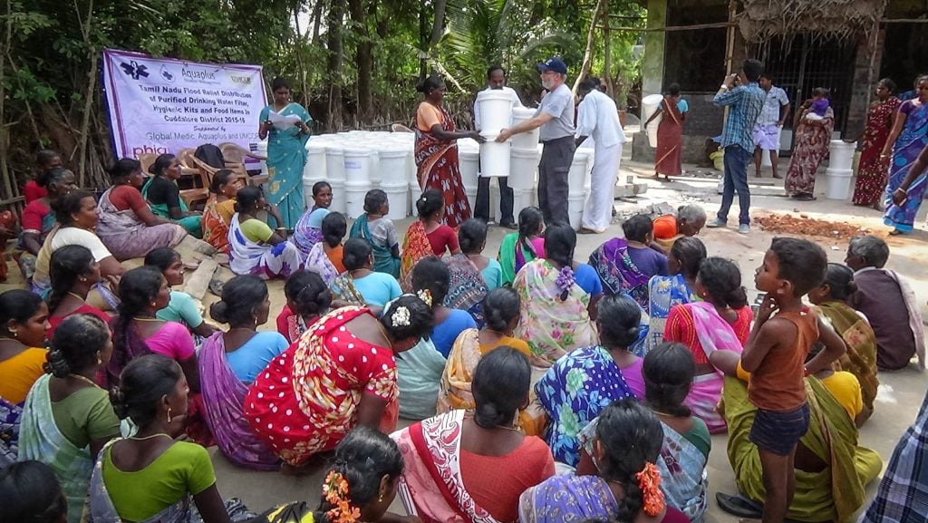 A Rapid Response Team member leads a training on household water purification units